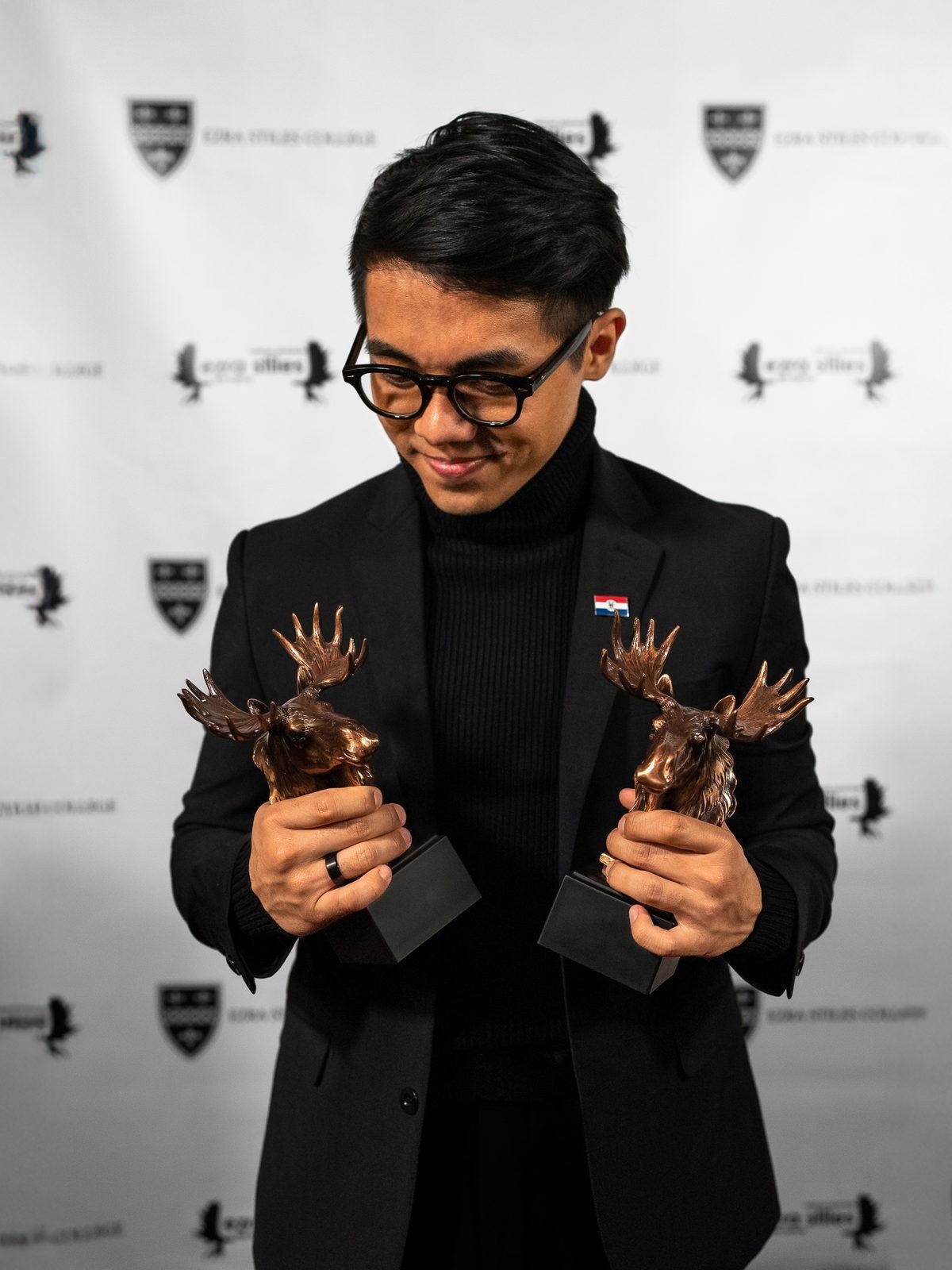 David Stanley NTM holding two film awards